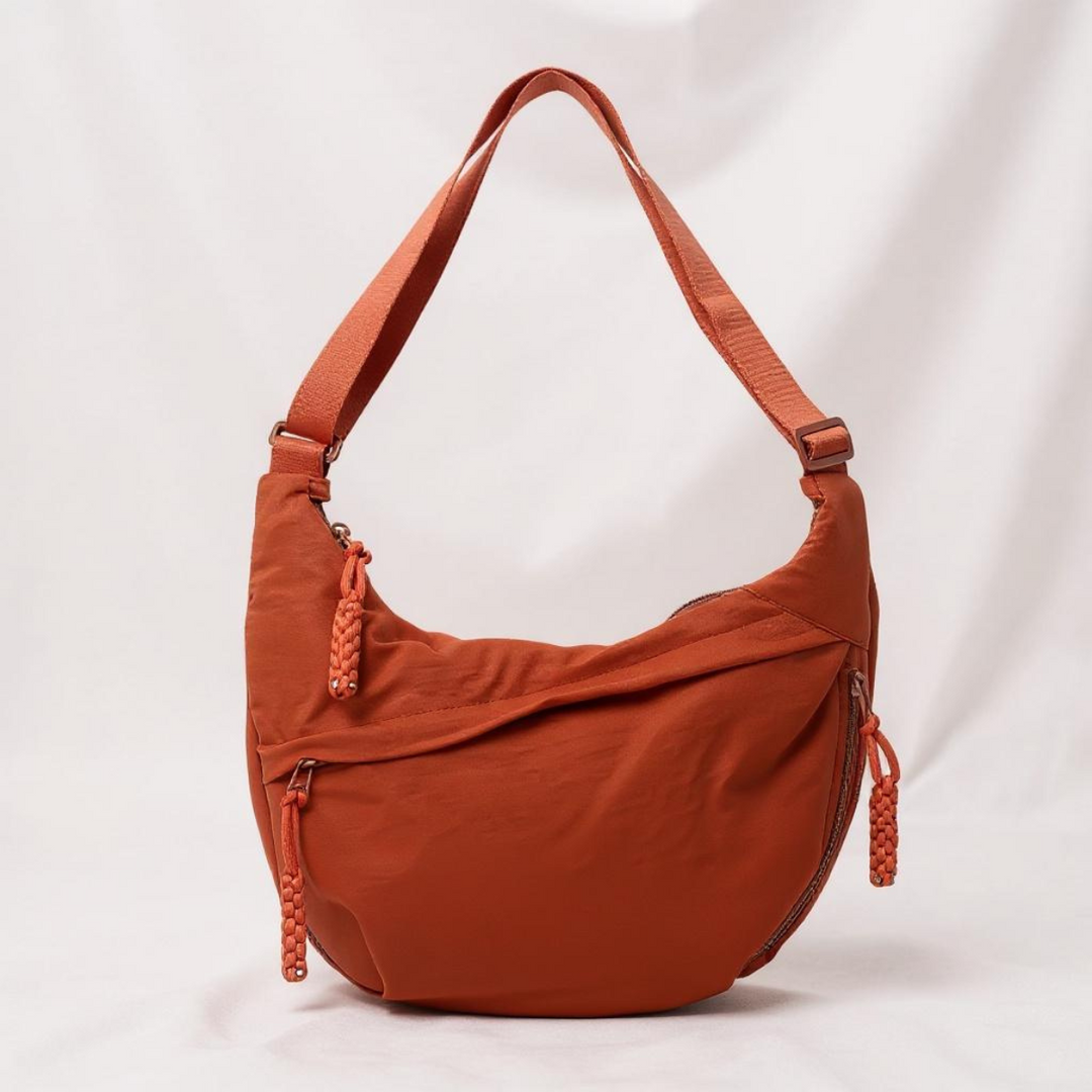 Soukaina | Curved Shoulder Bag With Zipper Pockets