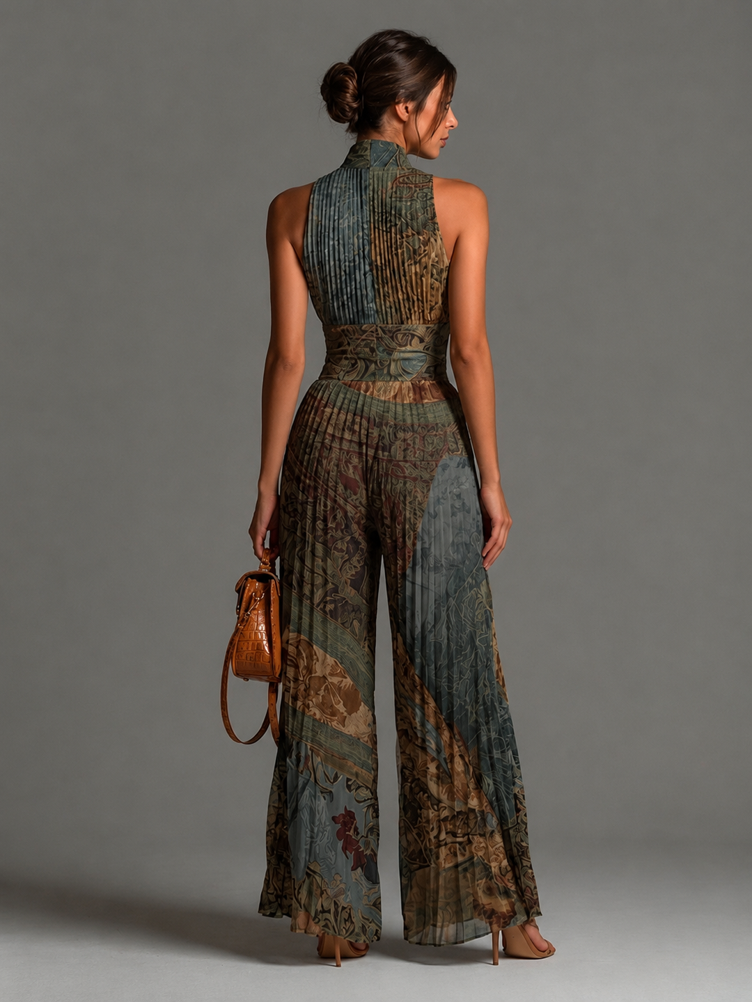 Kleira | Sleeveless Pleated Zip Front Jumpsuit